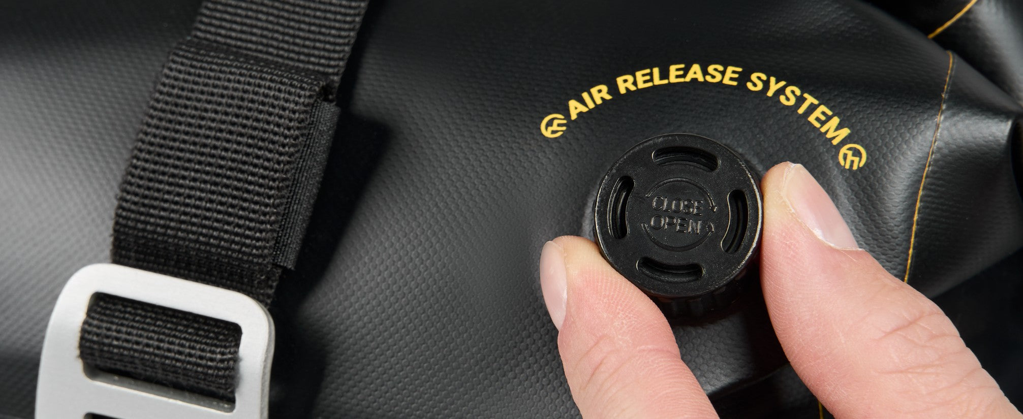 Motorcycle dry packs with air release system to make rolling the bag easy