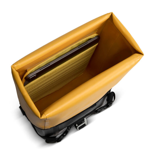 Laptop stored inside ODINSBERG Ragnarök 30L waterproof motorcycle bag