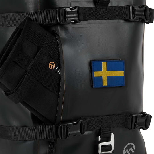 Close-up of external pocket and velcro flag patch on ODINSBERG saddle bag