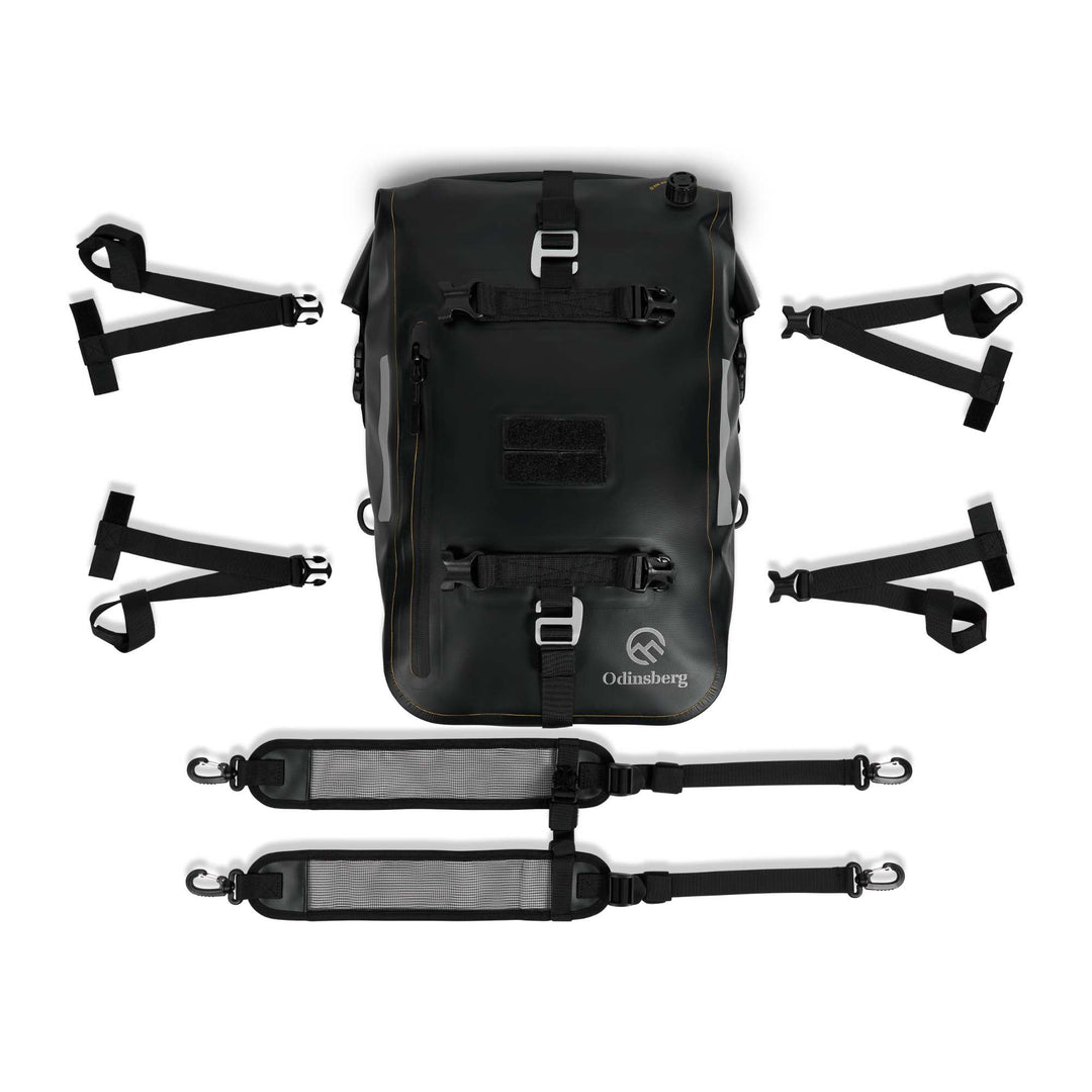 ODINSBERG Ragnarök 30L motorcycle dry bag with straps and accessories.