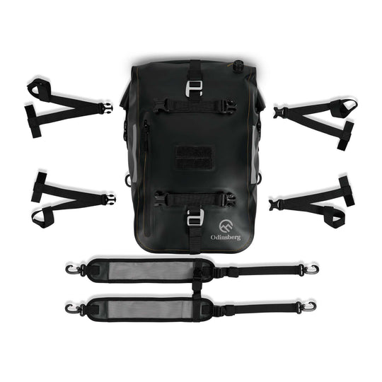 ODINSBERG Ragnarök 30L motorcycle dry bag with straps and accessories.
